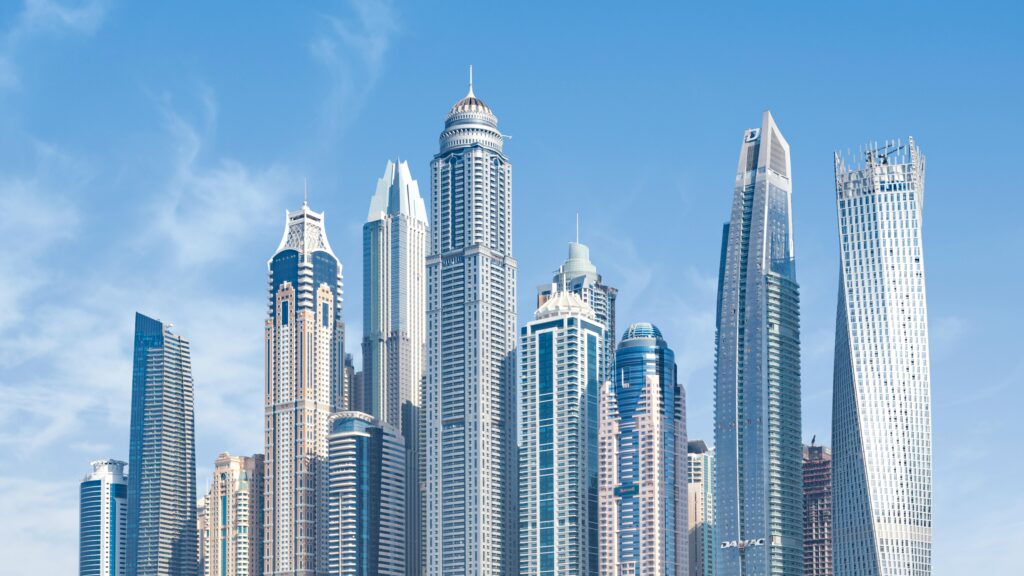 pexels photo 618079 618079 Stunning view of Dubai's iconic skyscrapers under a clear blue sky.